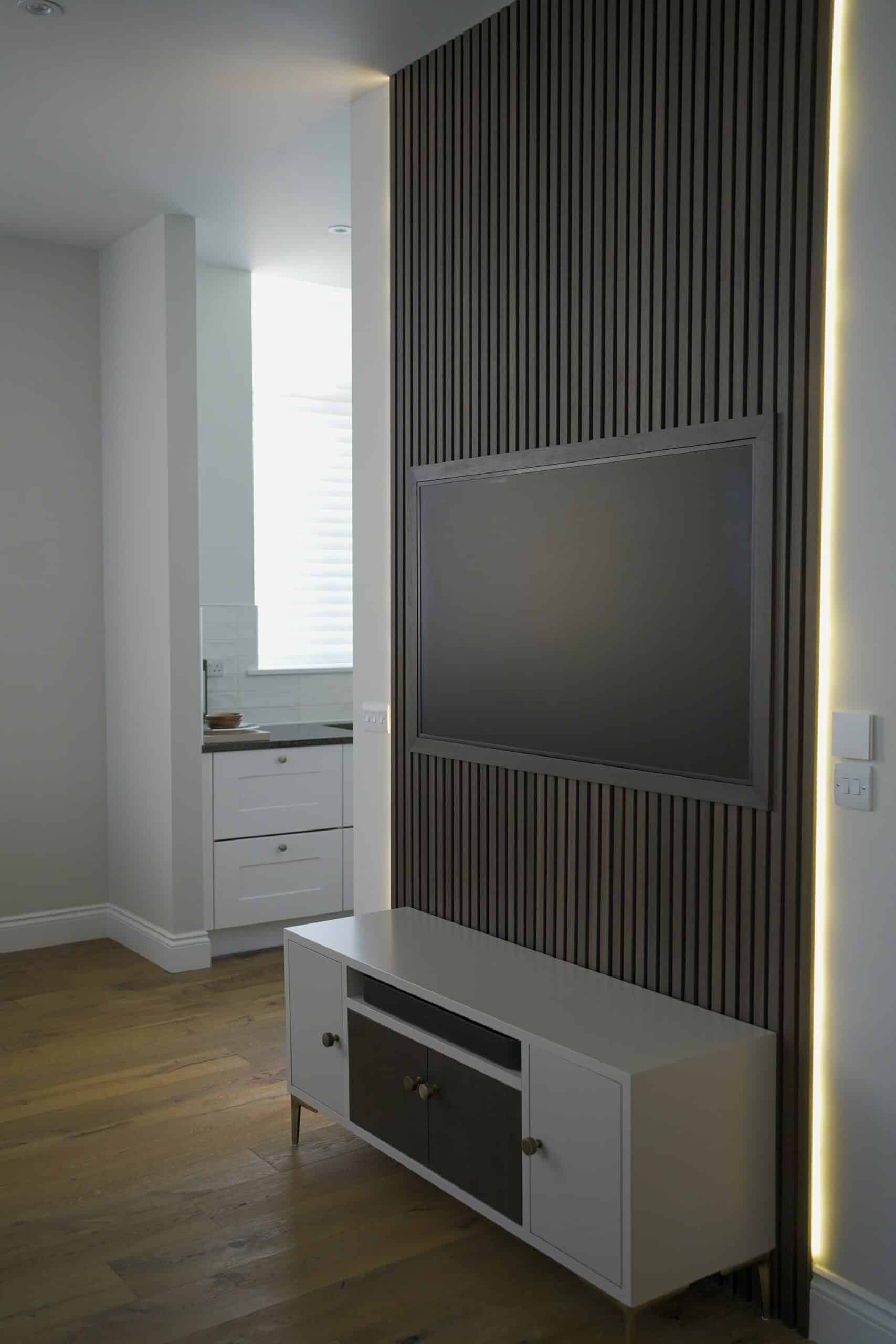 Bespoke media unit and feature wall with inset TV